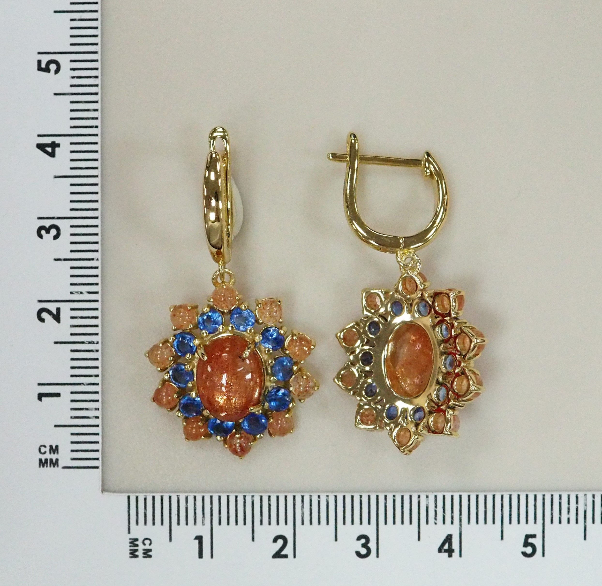 Серебряные серьги с солнечными камнями